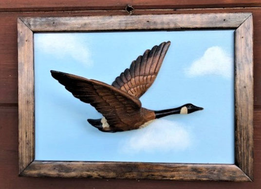 Carved Flying Canada Goose