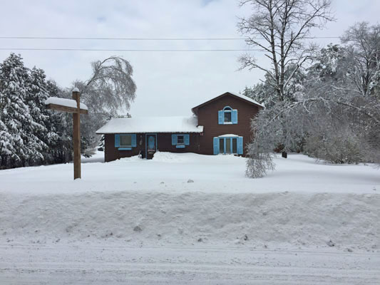 Outside the Shop in Snow